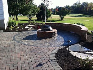 Fire Pit with Sitting Wall: Relax and Warm Up by the FIRE!